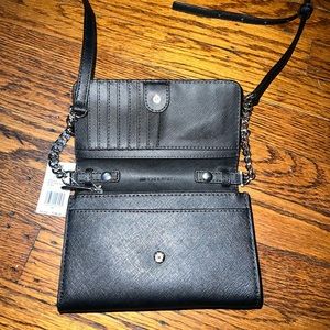 michael kohrs phone xbody bag. brand new with tags